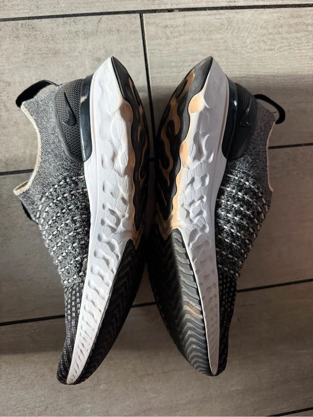Nike Black and White Knit Slip-On Sneakers